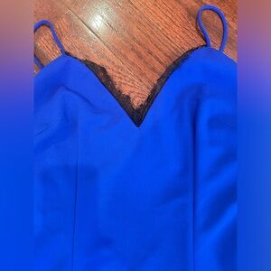 Long royal blue dress with a sexy silhouette.